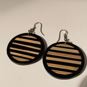 Lightweight earrings, slightly larger than a quarter